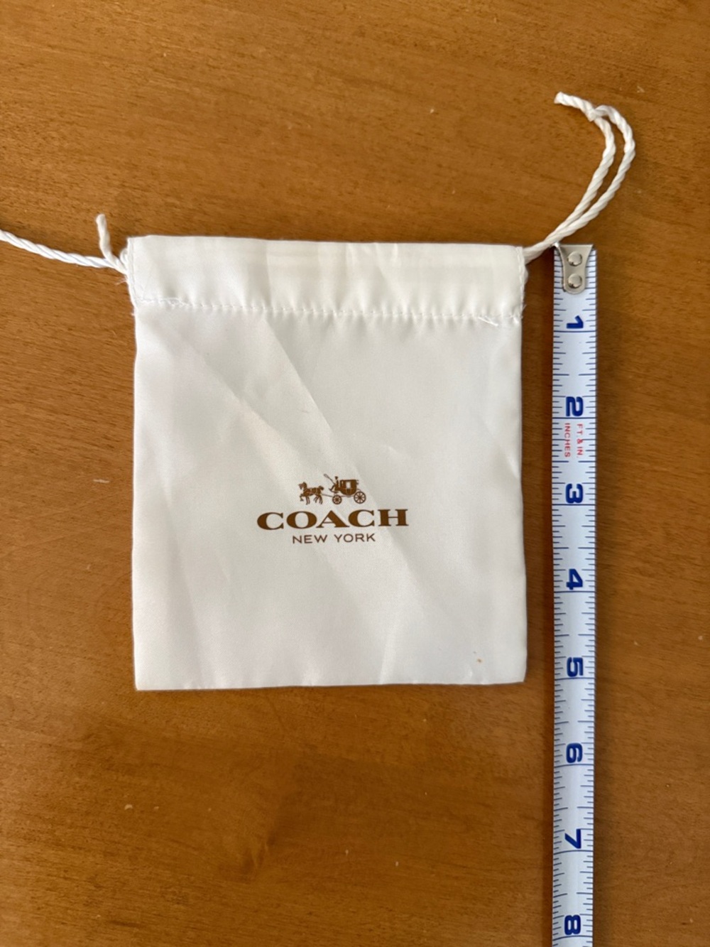 Coach Cream Drawstring satiny Pouch with Gold Logo